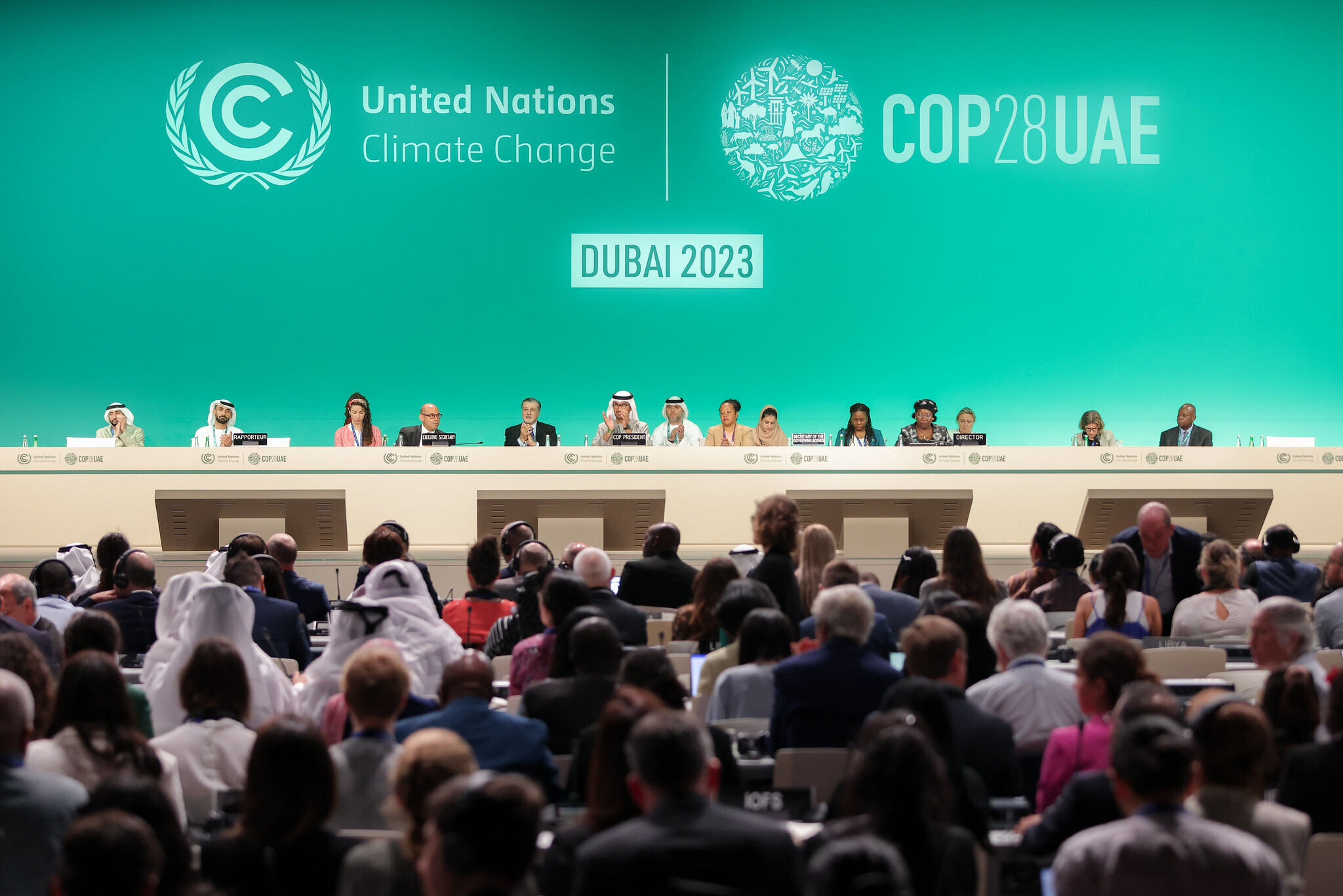 Speakers applaud onstage during the Closing Plenary at the UN Climate Change Conference COP28 at Expo City Dubai on December 13, 2023, in Dubai, United Arab Emirates.